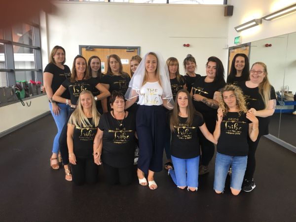 Fun Britney hen party dance class in Edinburgh with costumes